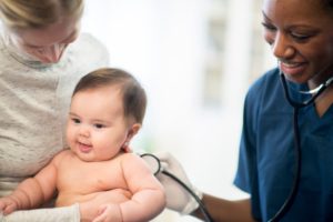 Pediatric Medical Assistant Checks Baby’s Vitals