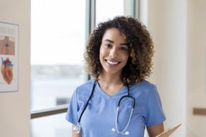 Nurse With Stethoscope And Clipboard