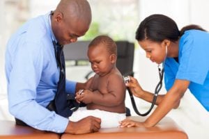 Pediatric Medical Assistant Examining Patient